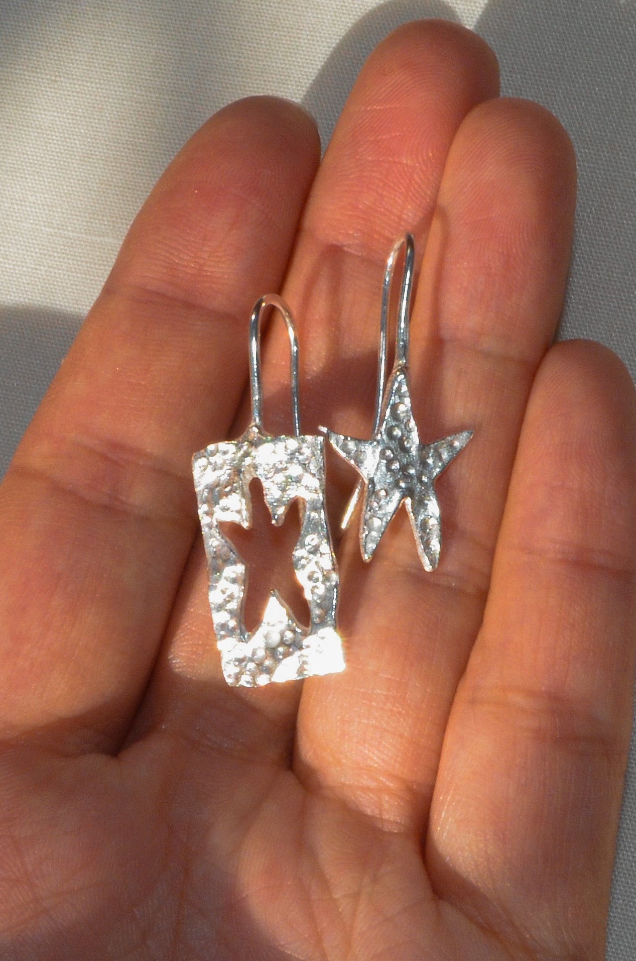 star cutout earrings
