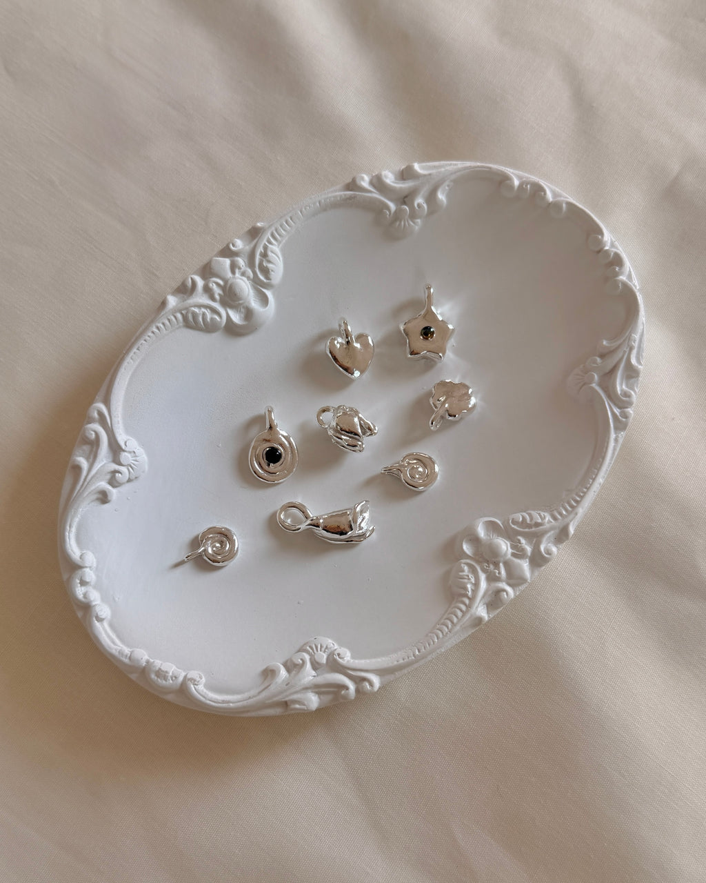 private workshop: silver charm making