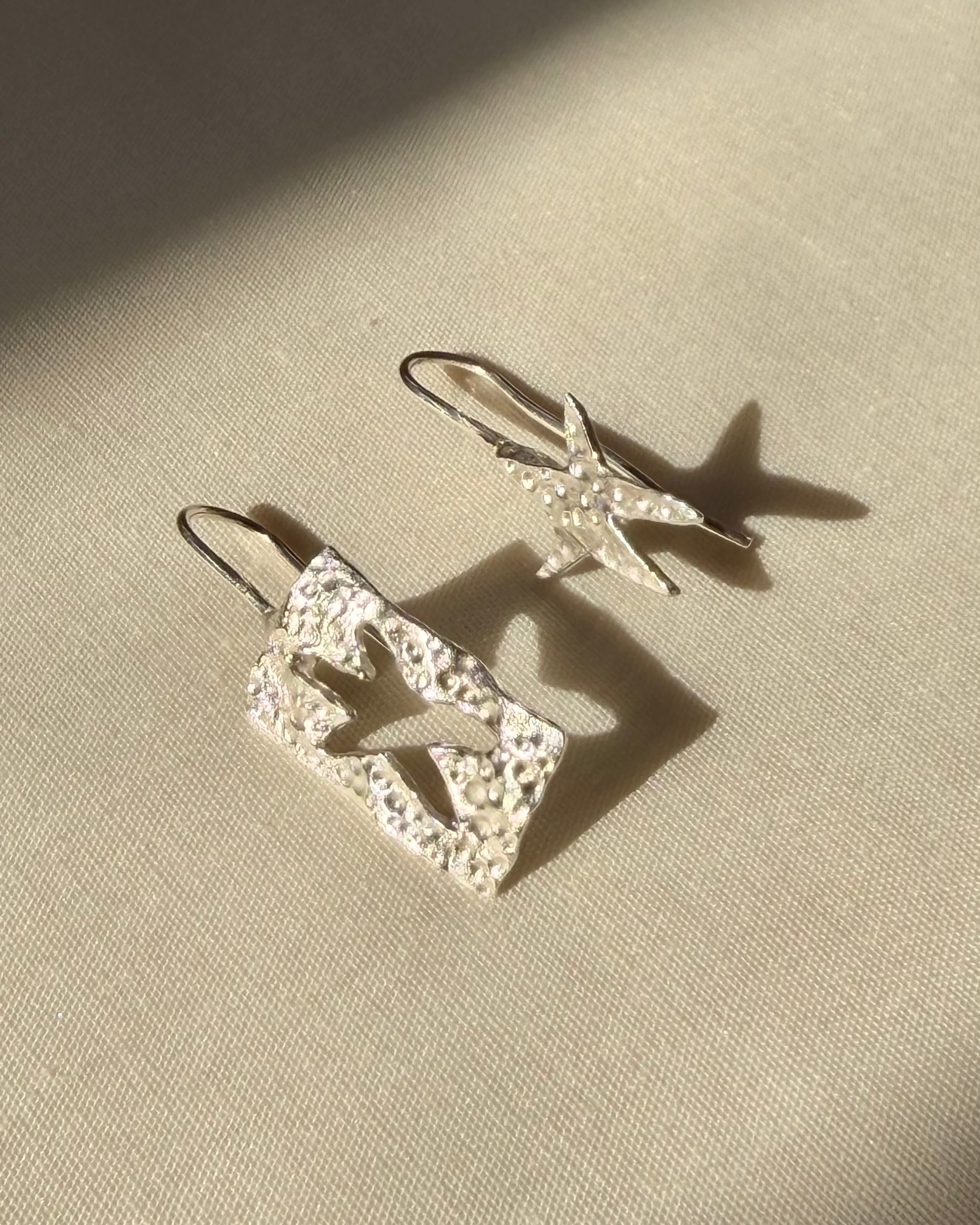 star cutout earrings