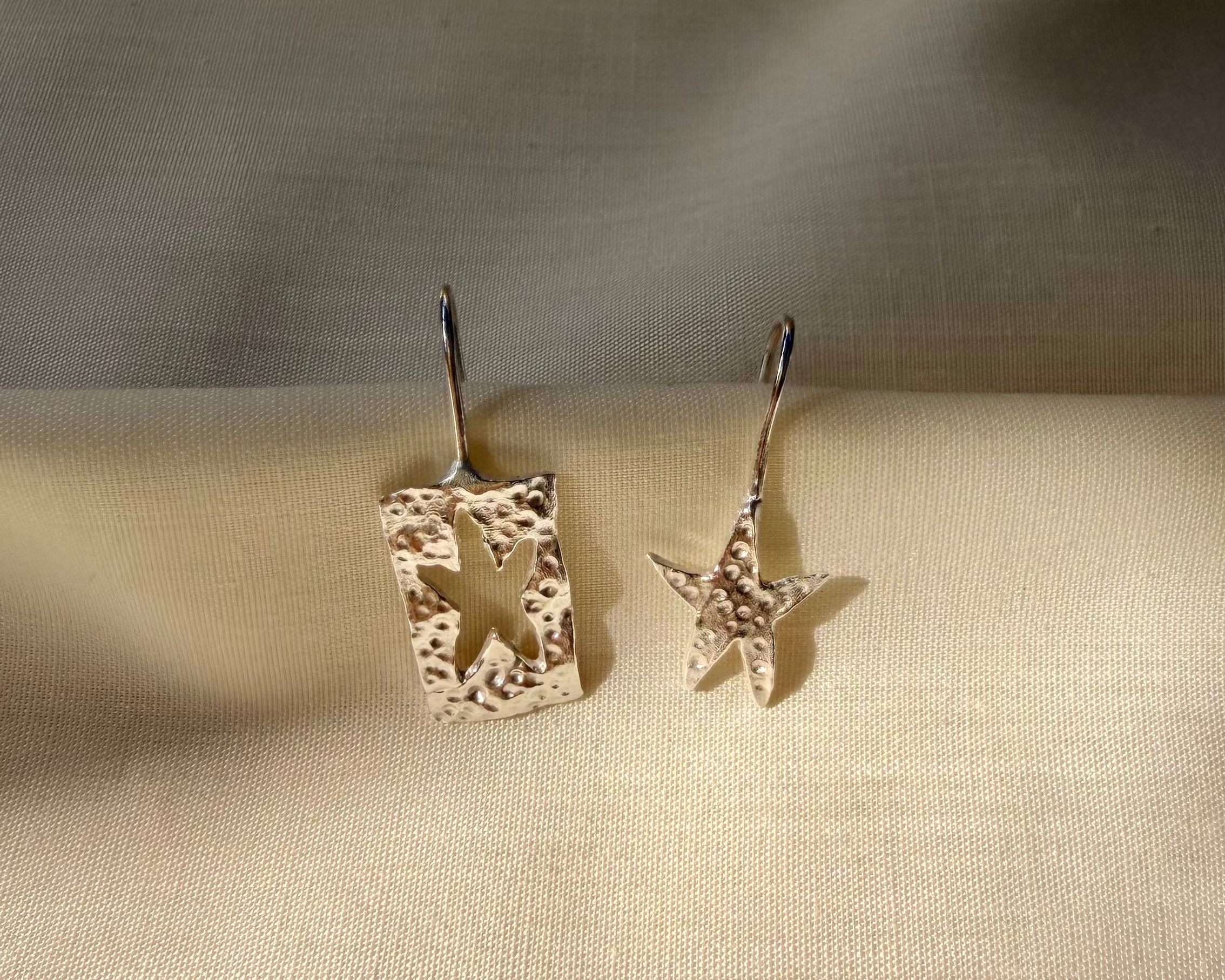 star cutout earrings